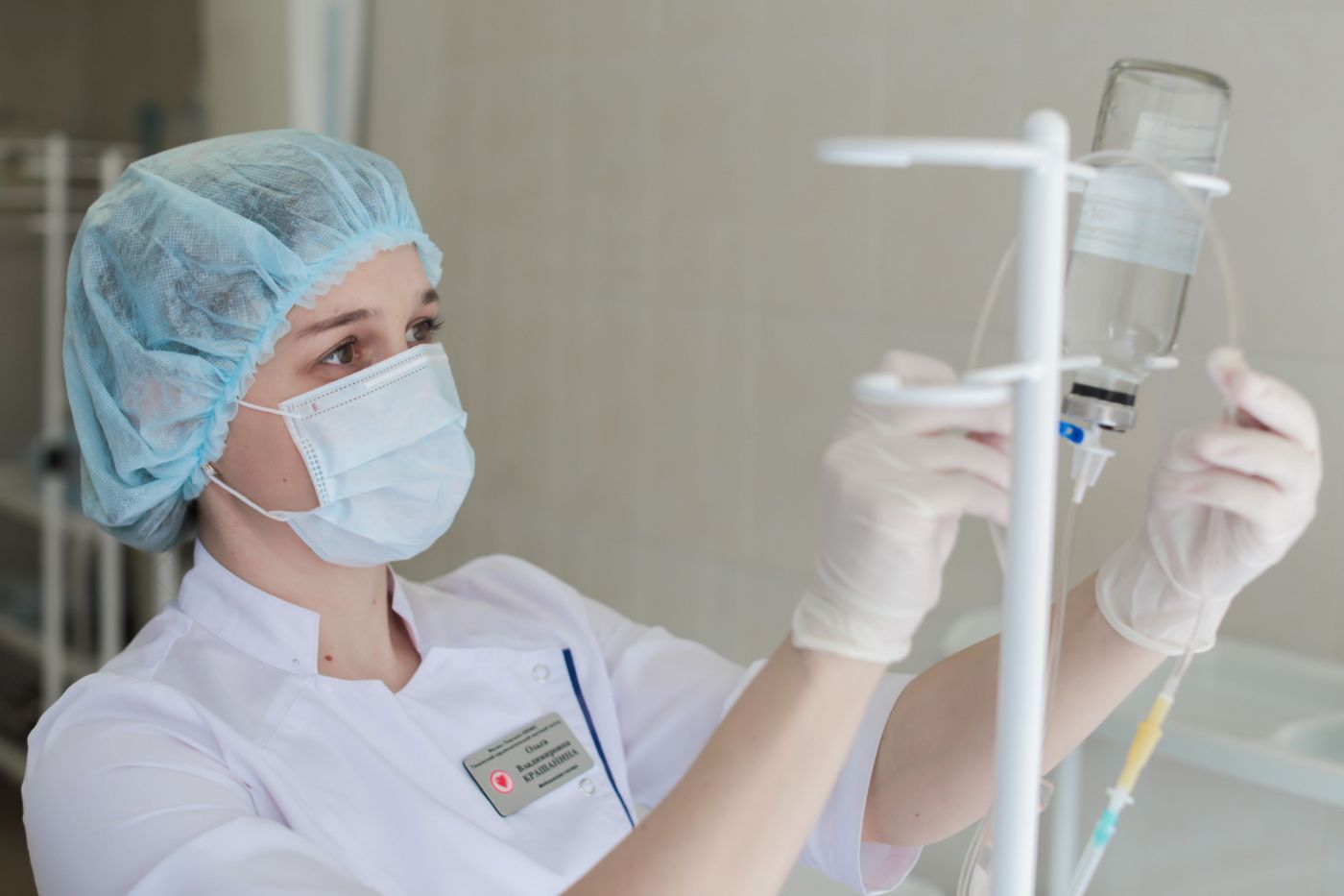 Take  treatment cycles of intravenous infusions or injections at medical day unit