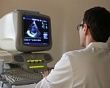 A student designs computer program in Tyumen Cardiology Research Center